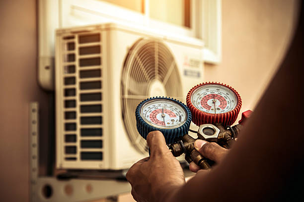 Professional Air Conditioning Service technician working in Chatsworth, IL